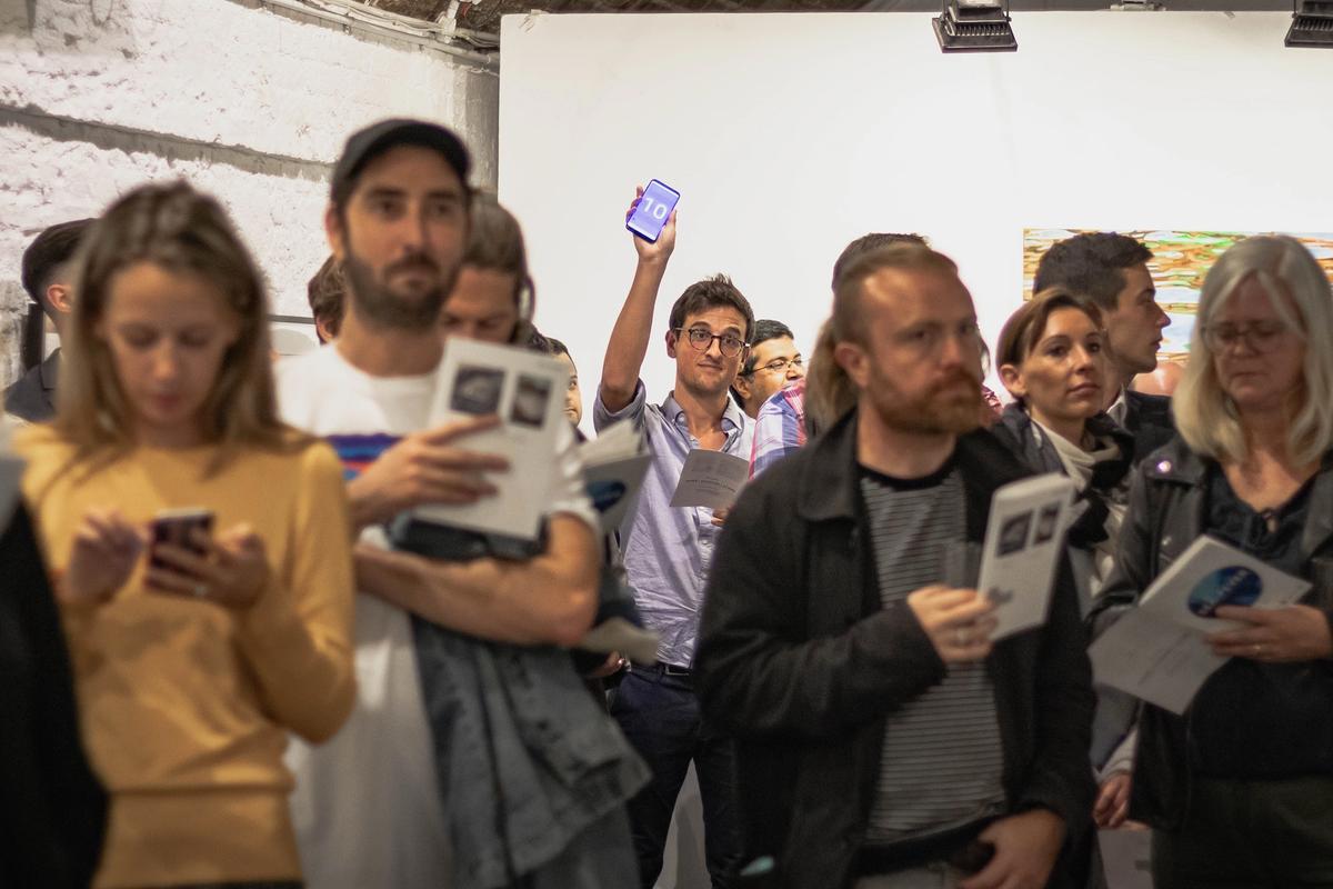 Artists consign work direct to the Auction Collective, and bidders use paddles on their phone and pay no buyer's premium © Auction Collective