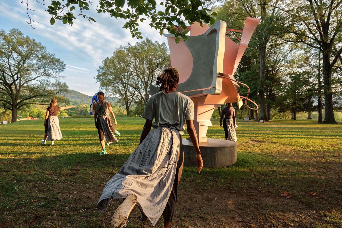 Girl Group Performance: Arlene Shechet x Annie-B Parson, at Storm King Art Center, New York. The dancers (from left) Natalie Green, Jin Ju Song-Begin, Brooke Ashley Rucker, and Kashia Kancey interact with sculpture by Arlene Shechet, to choreography by Annie-B Parson Photo: Erin Baiano