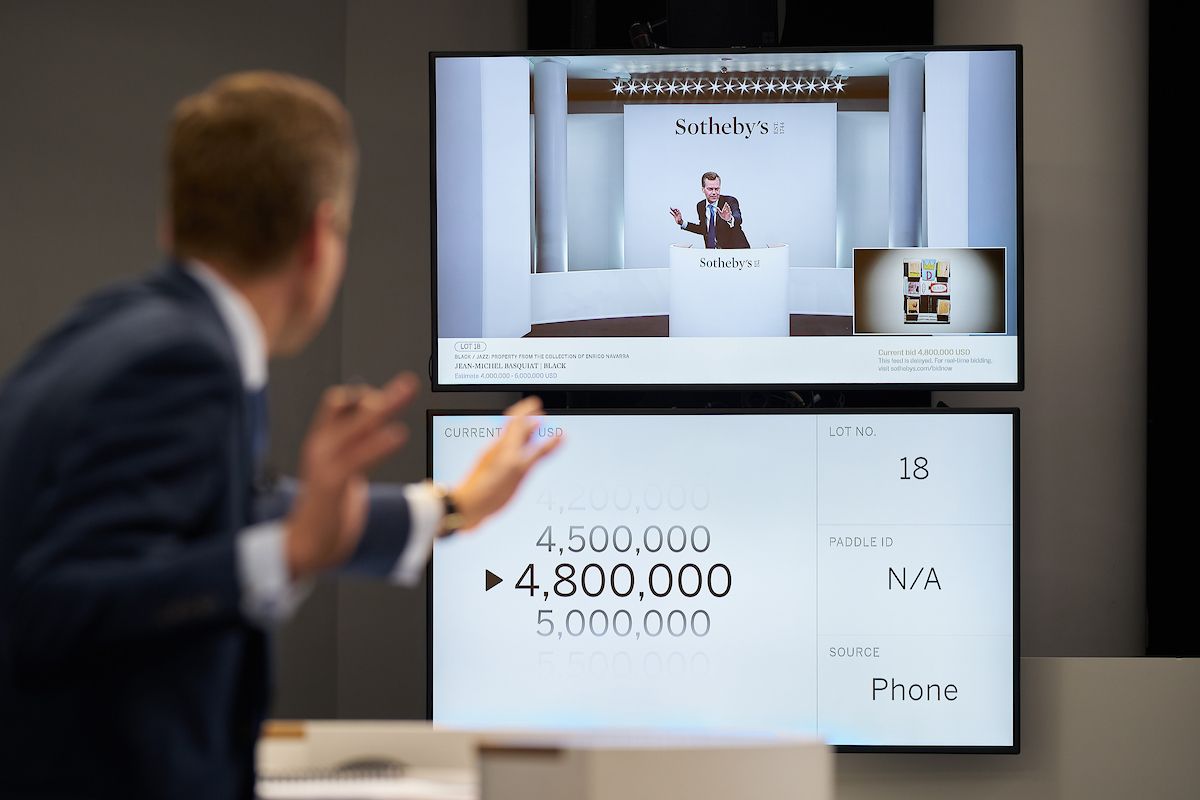 Auctioneer Oliver Barker selling Jean-Michel Basquiat's Black (1986) at the Sotheby's Contemporary Art Evening Auction in New York on 28 October Photo: Michael Bowles/Getty