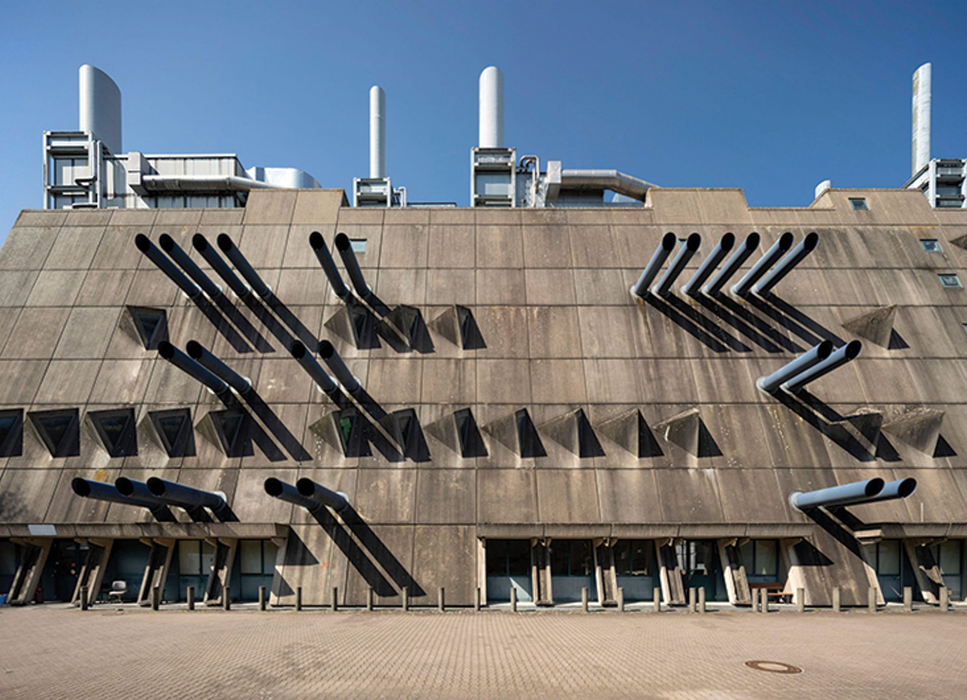 Protruding ventilation pipes and slit windows make the 1981 building resemble a warship Florian Monheim/Alamy