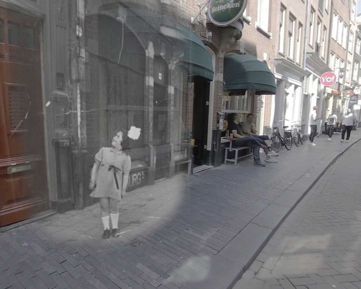 Still from the VR film Walk to Westerbork, showing the Holocaust survivor Rodi Glass as a young girl in front of her family’s storefront in Amsterdam
East City Films and Rodi Glass; courtesy Illinois Holocaust Museum and Education Center