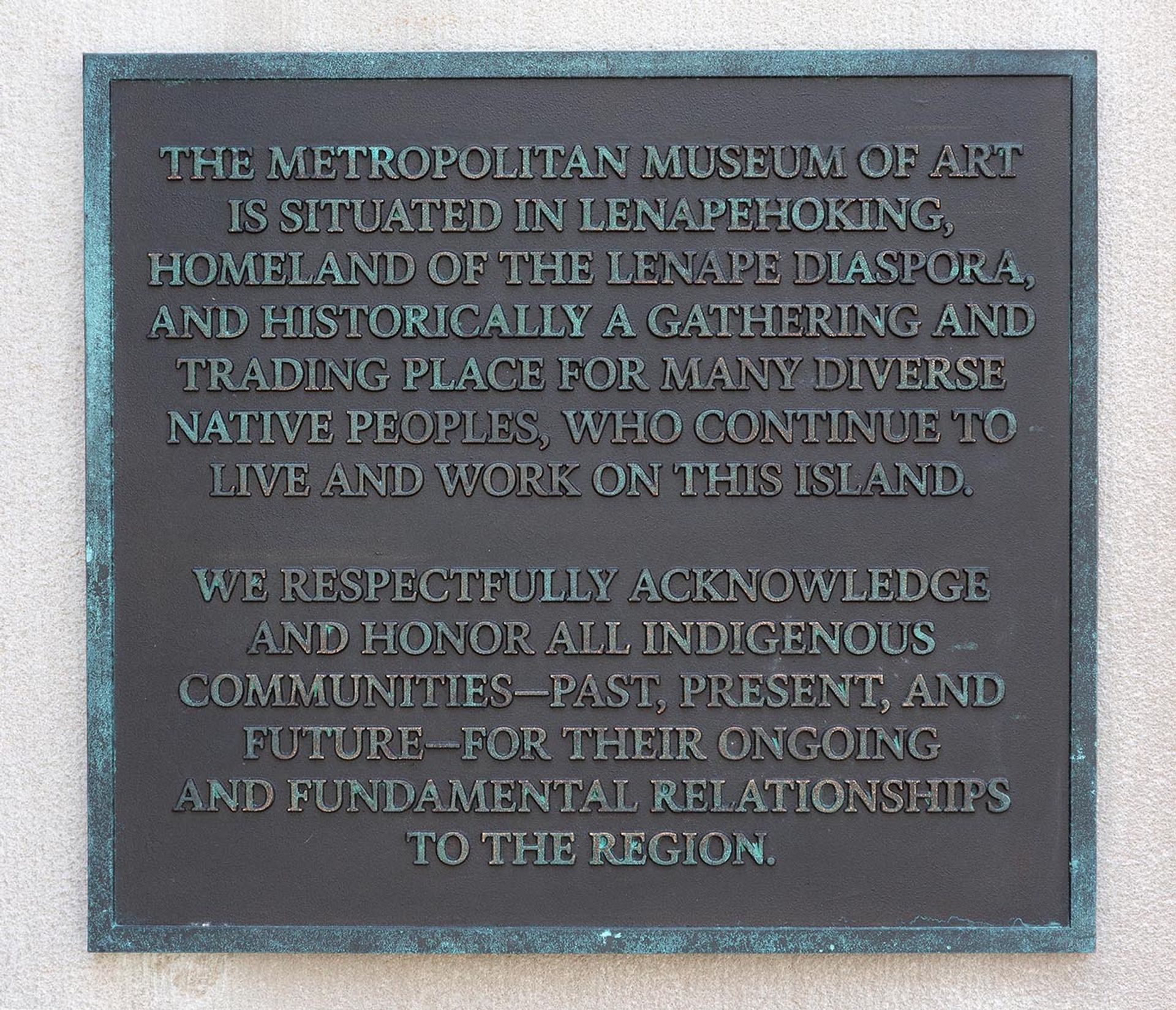 A plaque posted on the façade  of the Metropolitan Museum of Art acknowledging the history of the Lenape people on the institution's current site Photo by Bruce Schwarz; courtesy of the Metropolitan Museum of Art