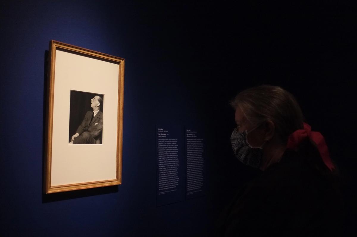 A visitor to the Man Ray exhibition at the Virgina Museum of Fine Art admires a portrait of Igor Stravisnky. Photo by Daniel Cassady