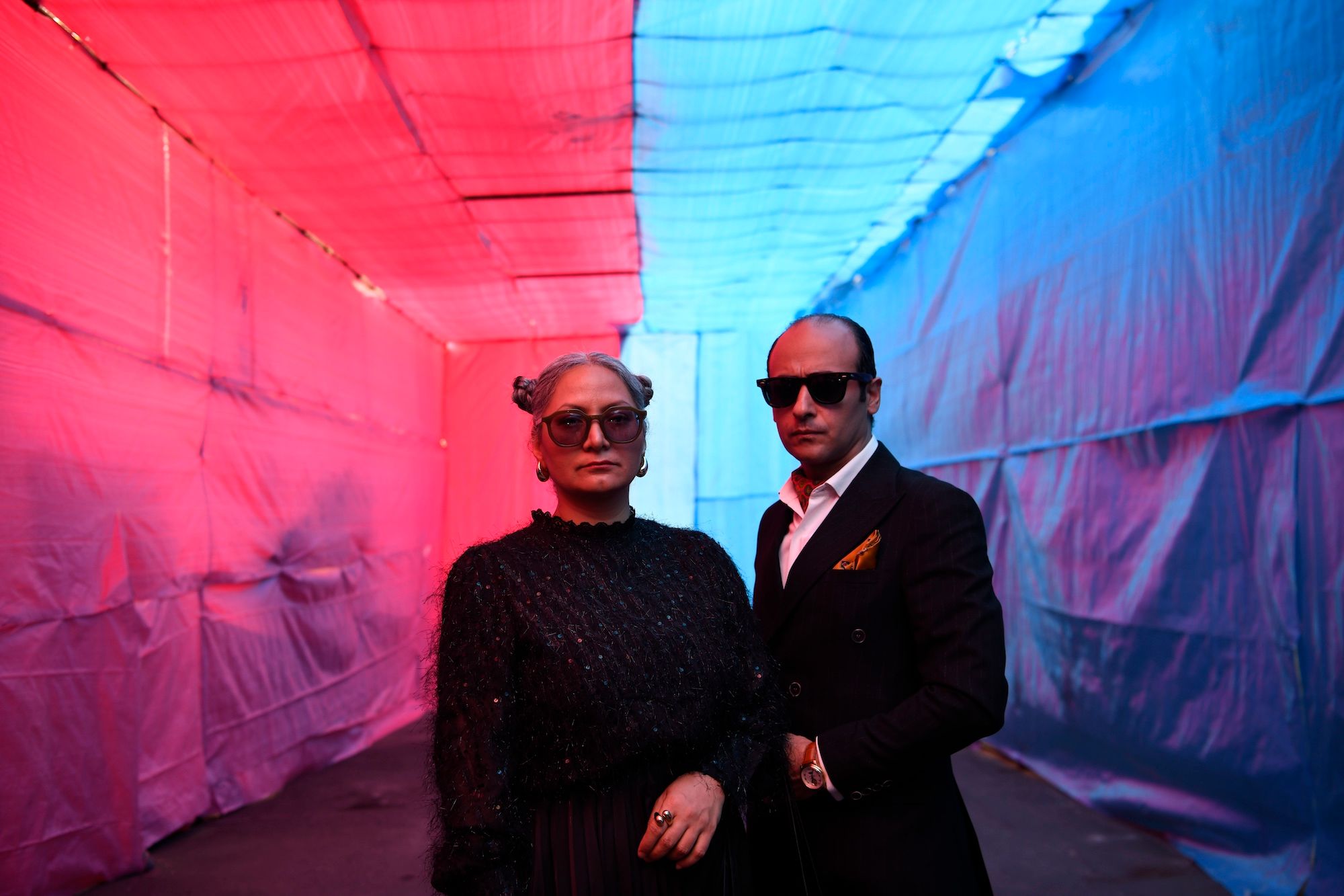 Roghayeh Najdi (left) and Nasser Bakshi in a scene from Mani Haghighi's I Deserve a Lover Whose Every Rise Sets Fiery Dooms Raging Across the Skies (2026) Courtesy Films Boutique, New York Film Festival