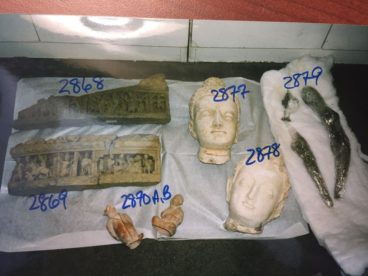 Among the objects seized by US authorities from storage facilities in New York were two stucco Gandharan Buddha heads that were excavated from Afghanistan after paying off a Mujahedeen commander who controlled the area