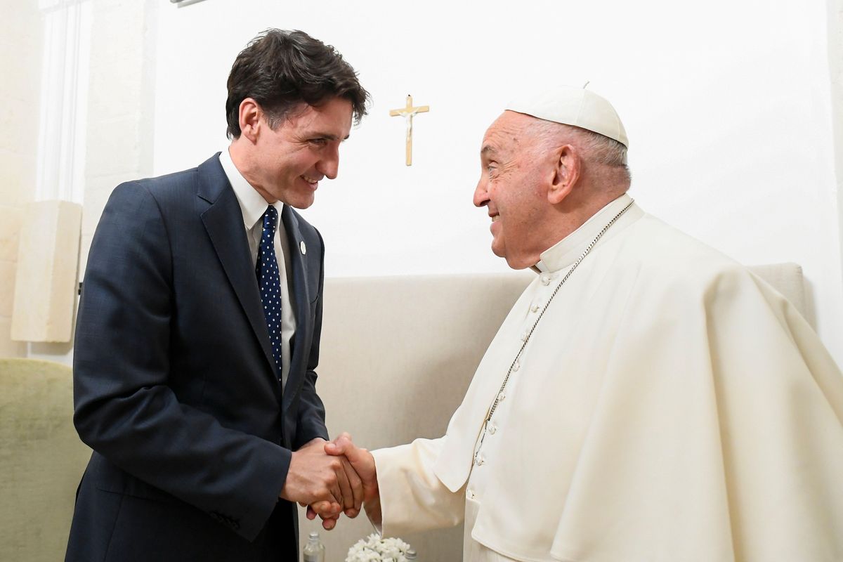 Canadian prime minister Justin Trudeau shakes hands with Pope Francis during the G7 summit on 14 June in Italy Independent Photo Agency Srl / Alamy Stock Photo