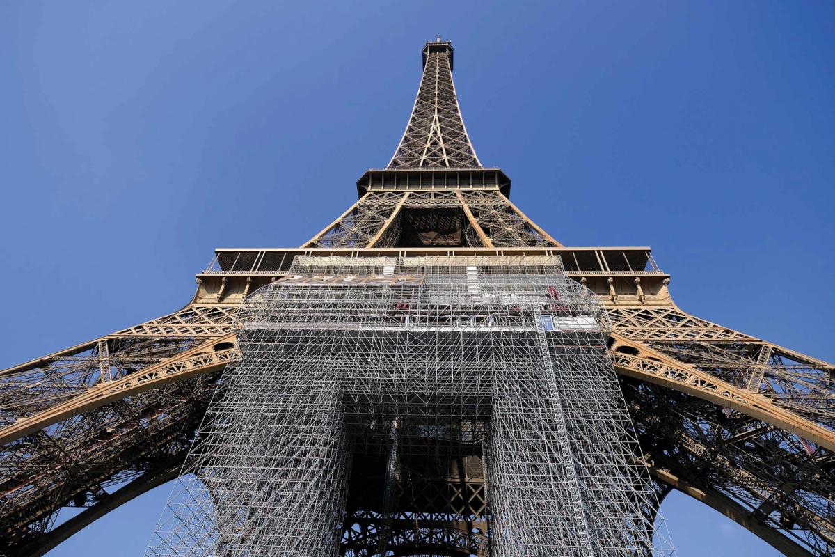 The Eiffel Tower is supposed to be repaired and repainted every seven years, but is now well overdue

Photo: Yann Vernerie


