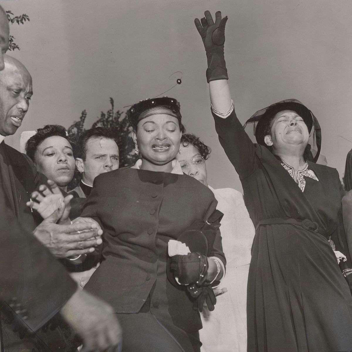 Mamie Till-Mobley (centre) and other mourners at Emmett Till's funeral, 6 September 1955 Photo: Dave Mann / Collection of the Smithsonian National Museum of African American History and Culture