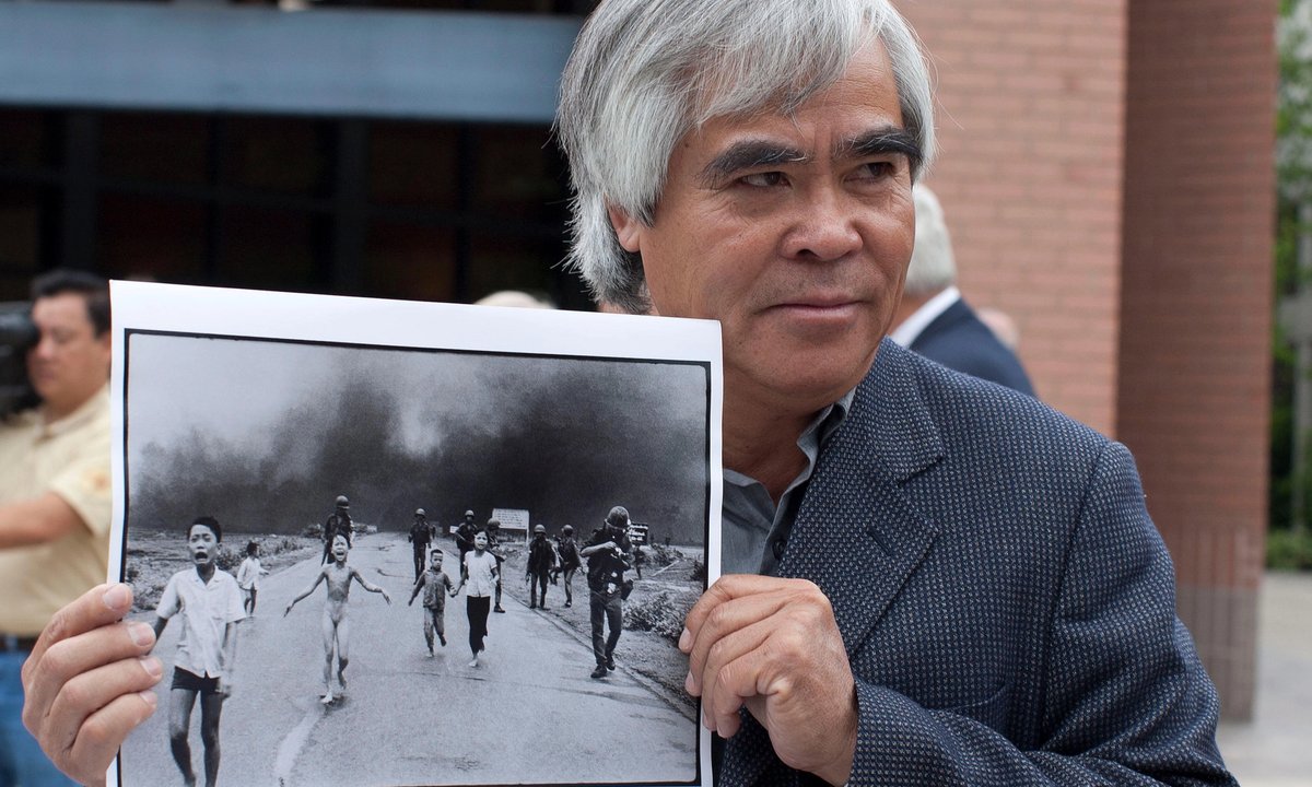 Debate over author of 'Napalm Girl' image deepens as World Press Photo suspends attribution
