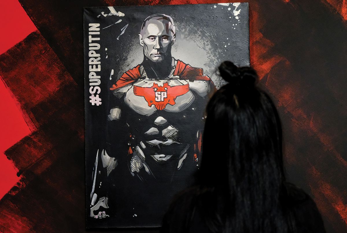 This image of Putin as a superhero is a sardonic take on his decision to run for re-election YURI KADOBNOV/AFP/Getty Images