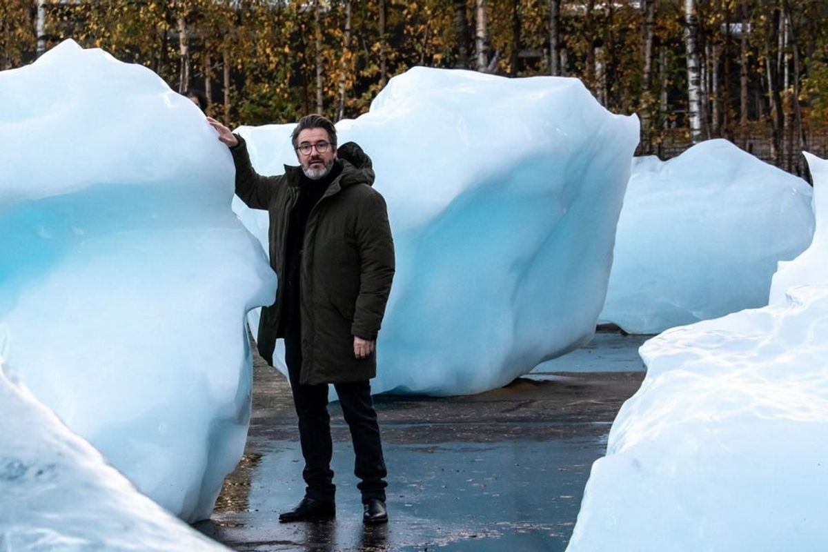 Olafur Eliasson with a piece of iceberg from his London Ice Watch installation Photo: Matt Alexander/PA Wire