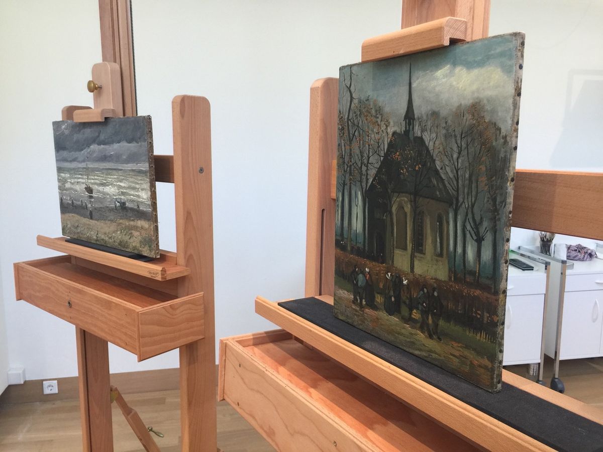 View of the Sea at Scheveningen (1882) and Congregation leaving the Reformed Church in Nuenen (1884-85) in the conservation studio, Van Gogh Museum, Amsterdam, on 16 April Photo: Martin Bailey