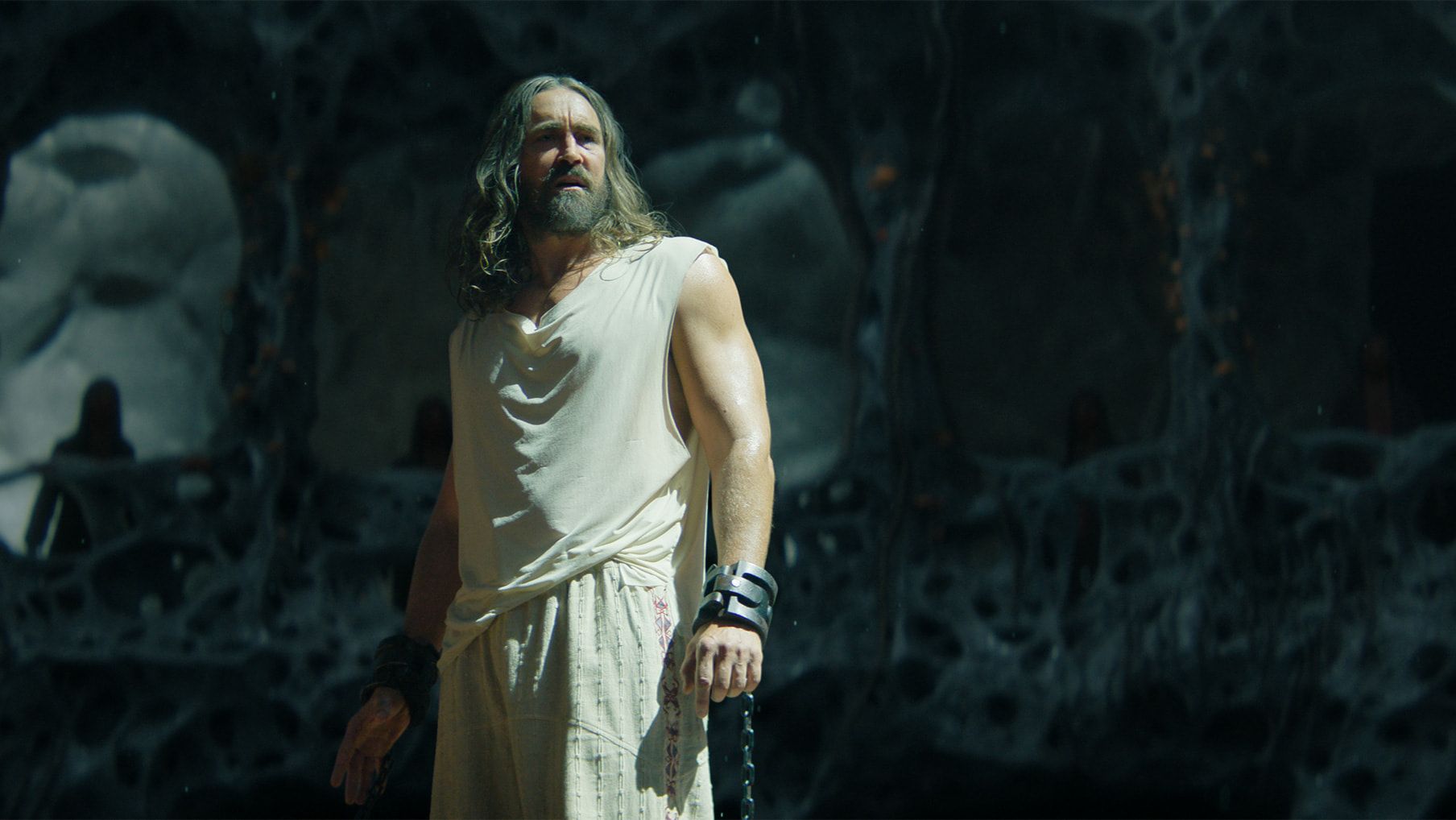 Day standing in chains during his trial
