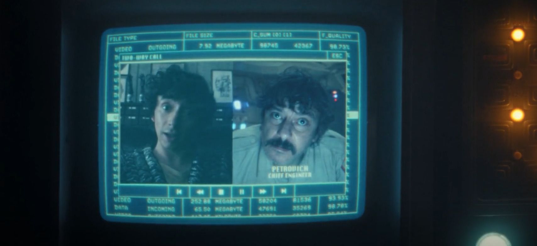 Split-screen of a secret video call between Petrovich and Boy Kavalier, revealing their conspiracy, seen from Morrow’s recovered ship records