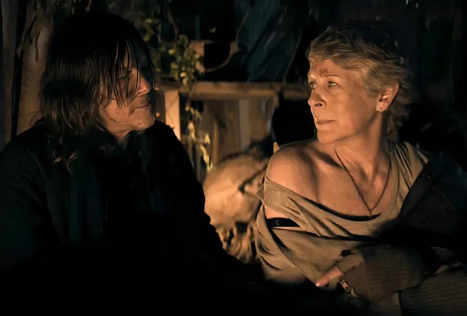 Daryl tending to Carol’s back injury on the coast of Spain.