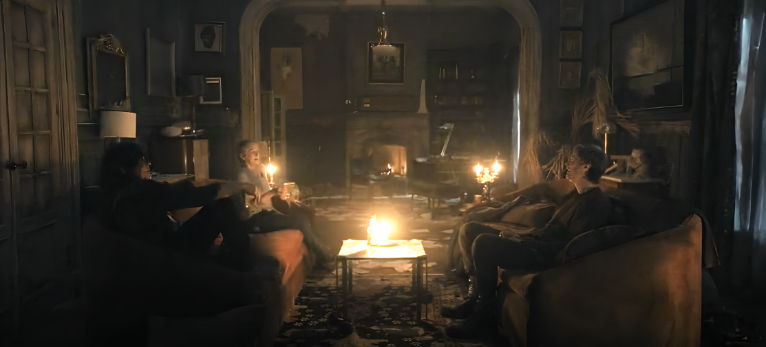 Daryl, Carol, and Julian sitting and talking about the sail plan.