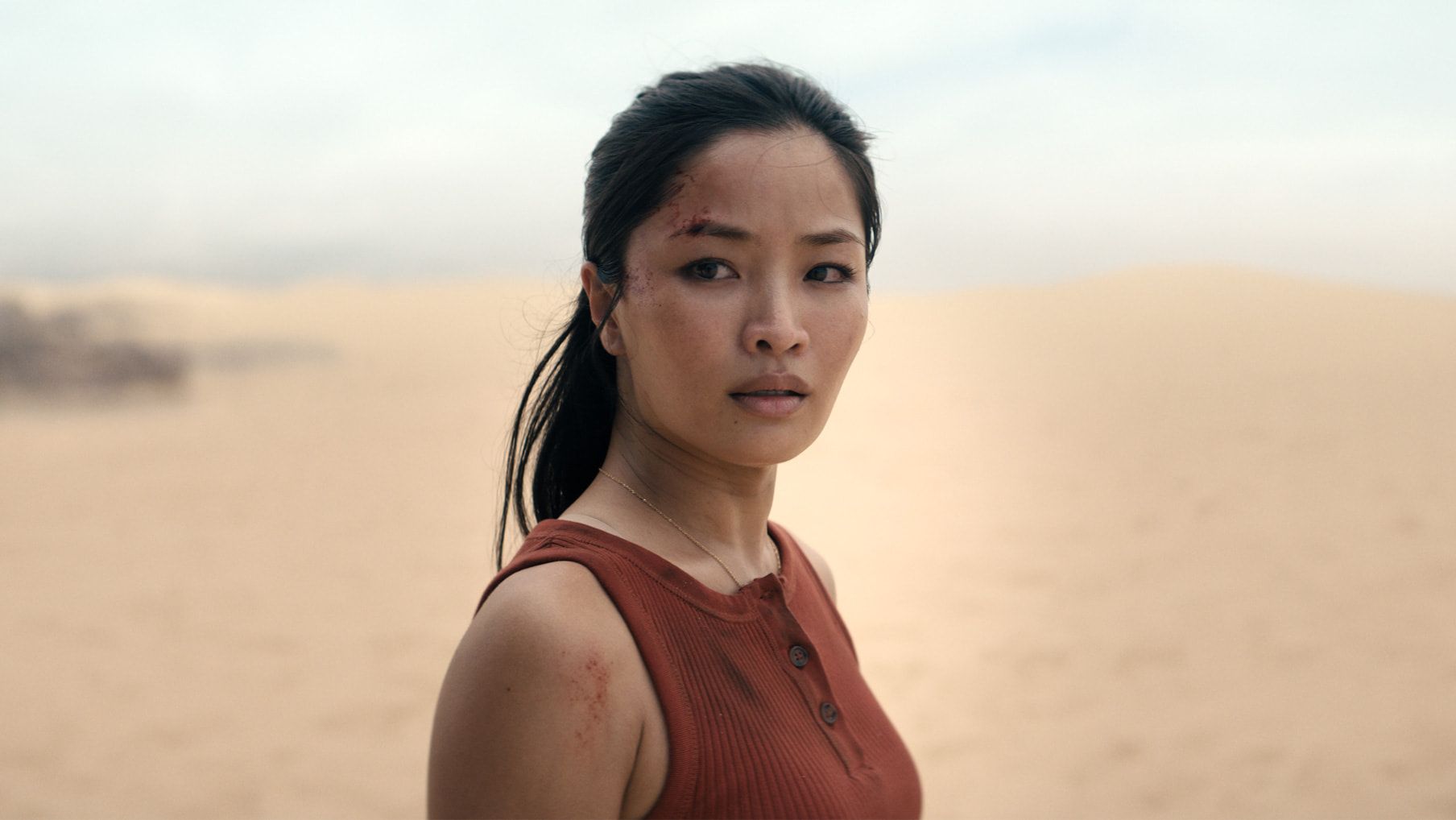 Anna Sawai as Cate Randa.