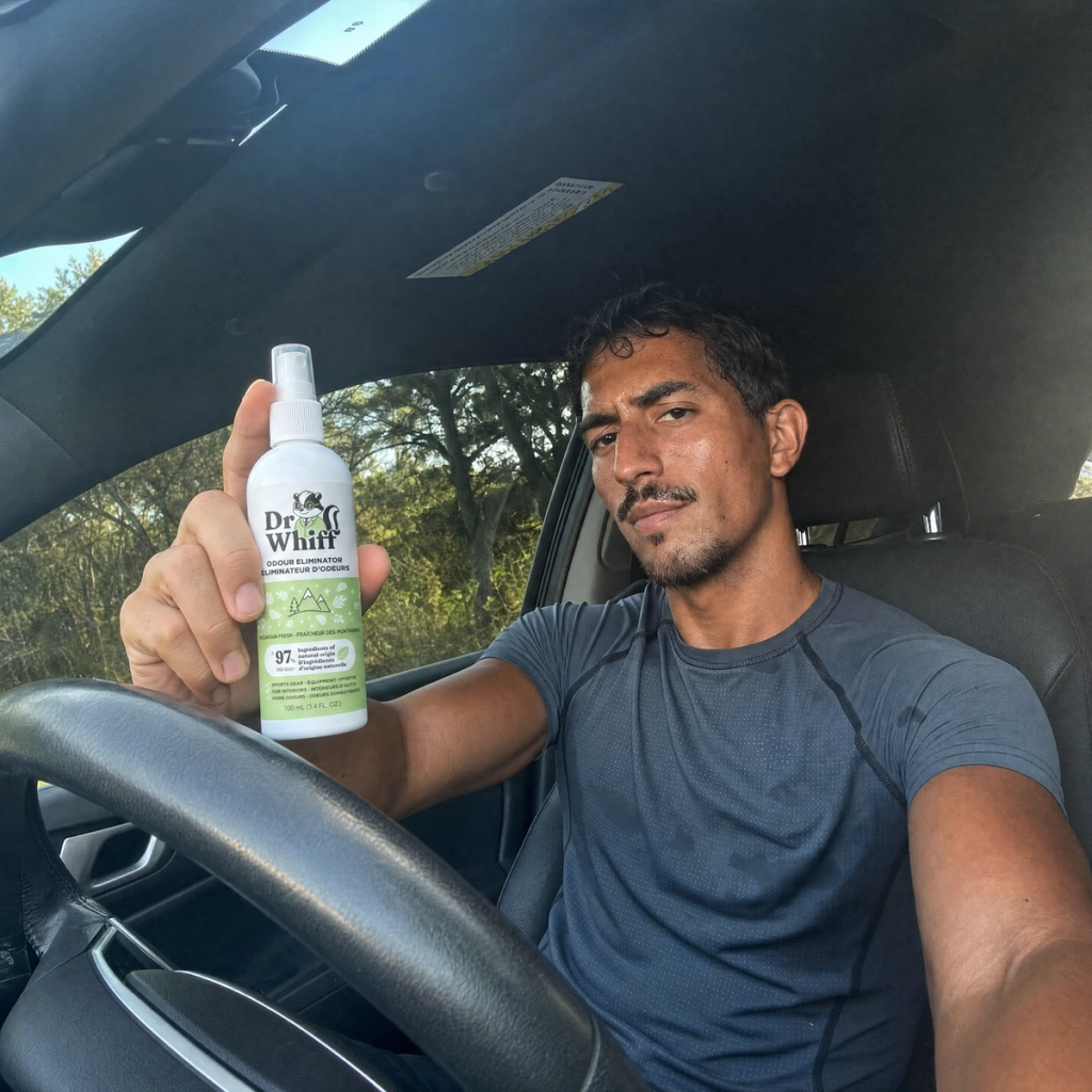 Dr. Whiff sprays on a car dashboard.