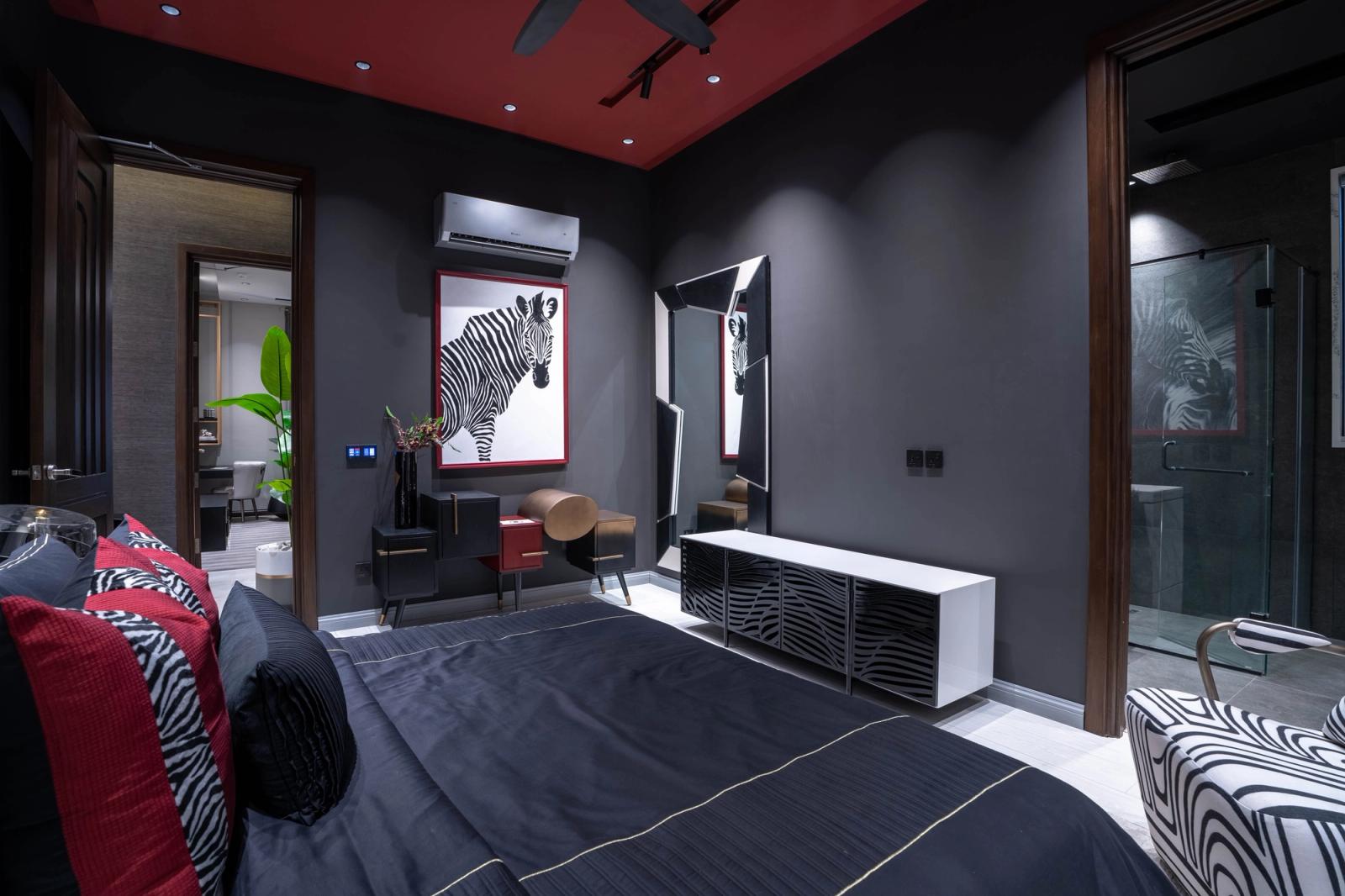 A dark marble-and-glass contemporary villa.