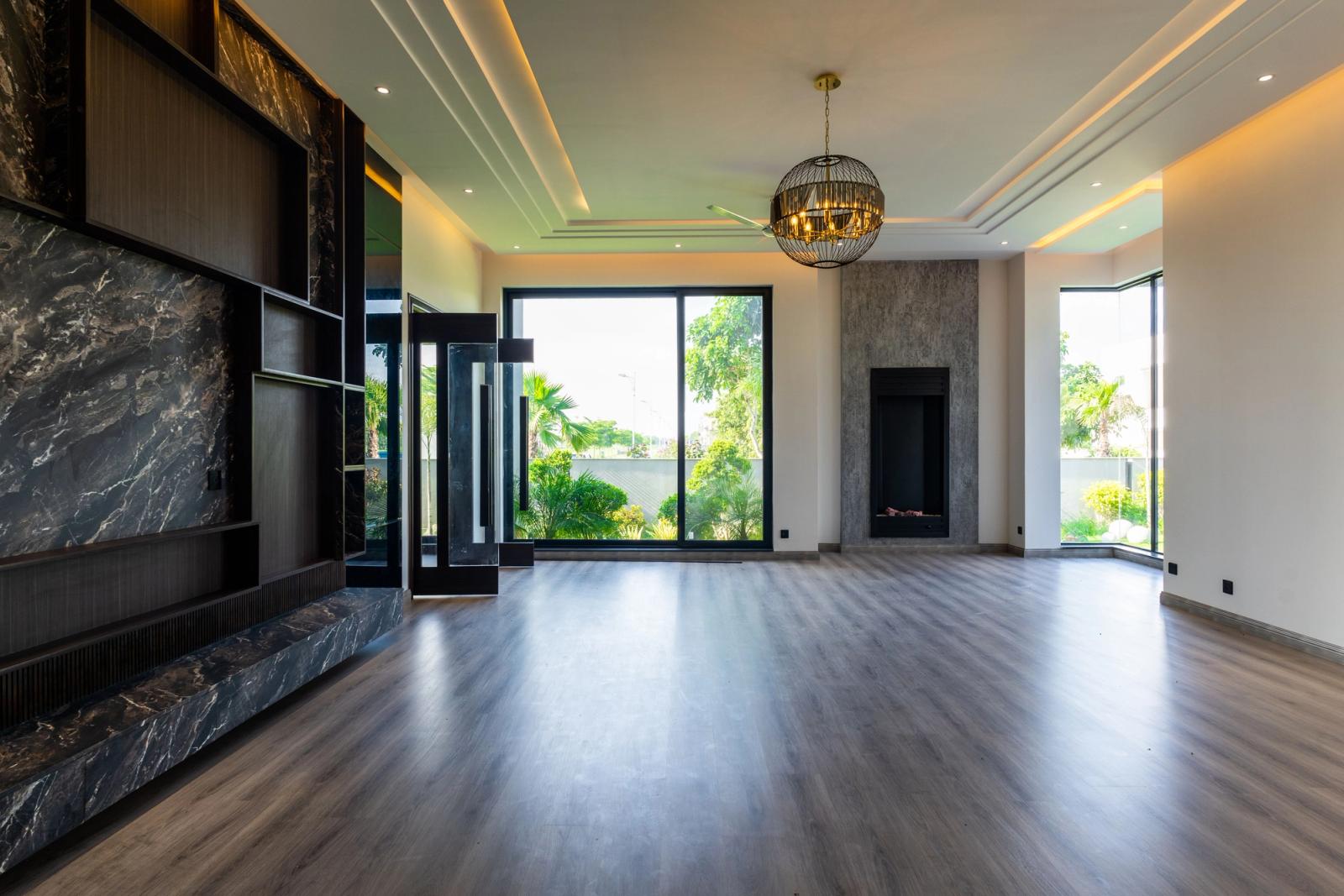 A boxy grey contemporary steel-and-glass villa.