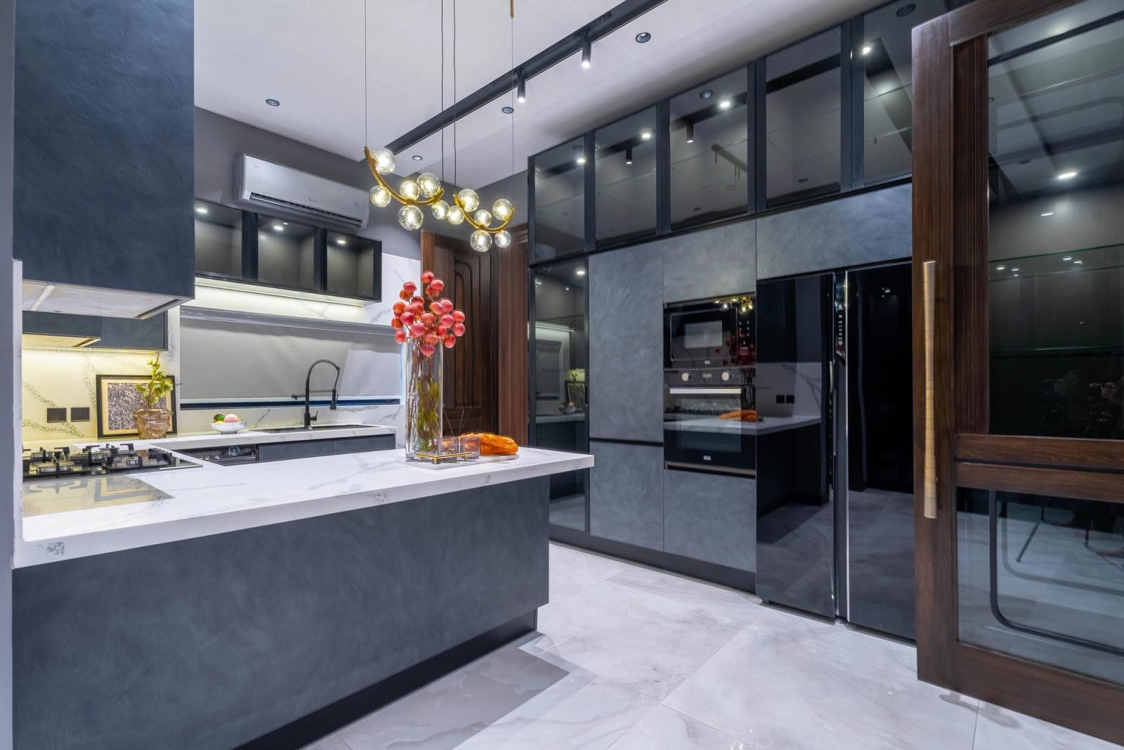 A dark marble-and-glass contemporary villa.