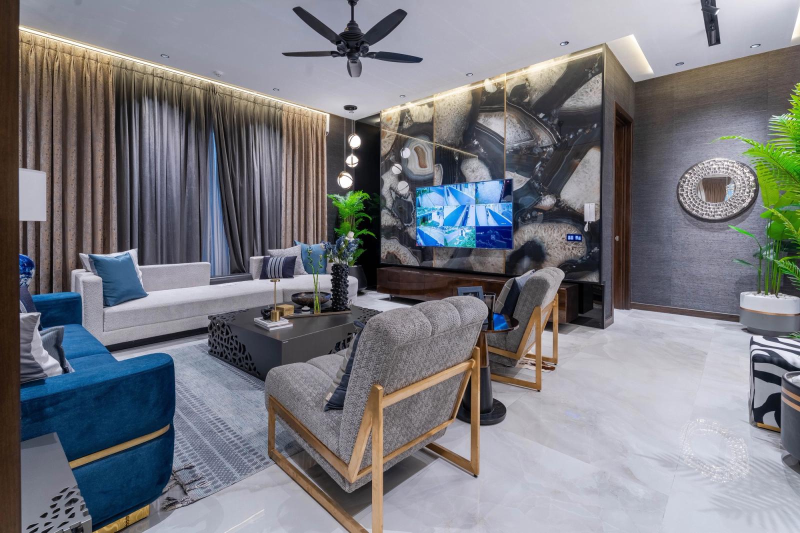 A dark marble-and-glass contemporary villa.