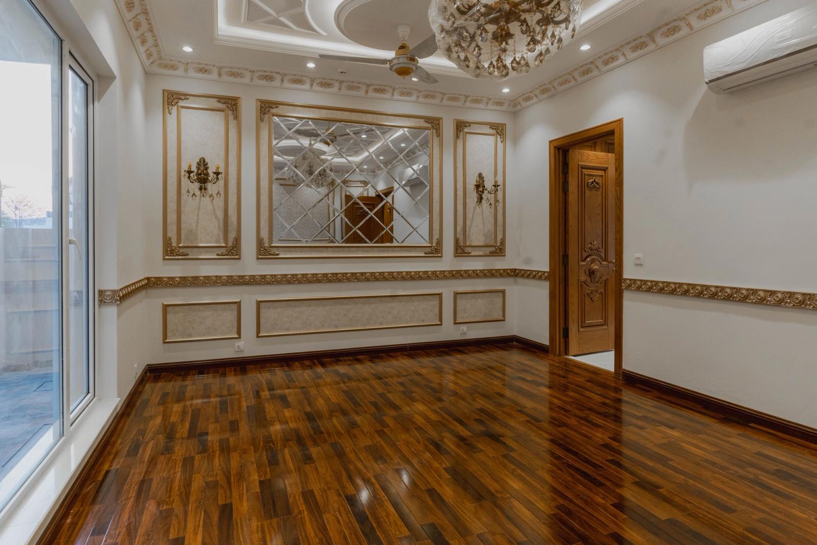 A Mediterranean-revival villa with arched loggias and a tiled roof.