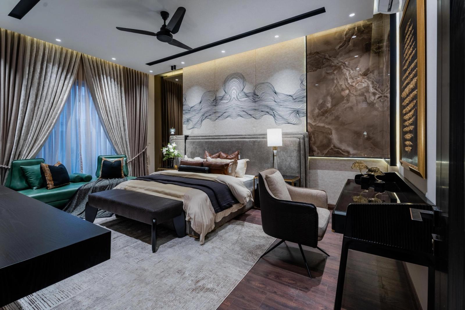 A charcoal-clad contemporary villa with tropical gardens.