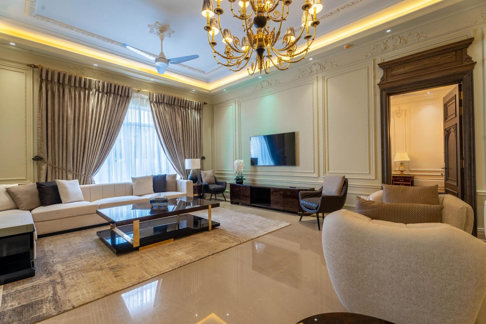 A palatial classical estate with grand, ornate interiors.