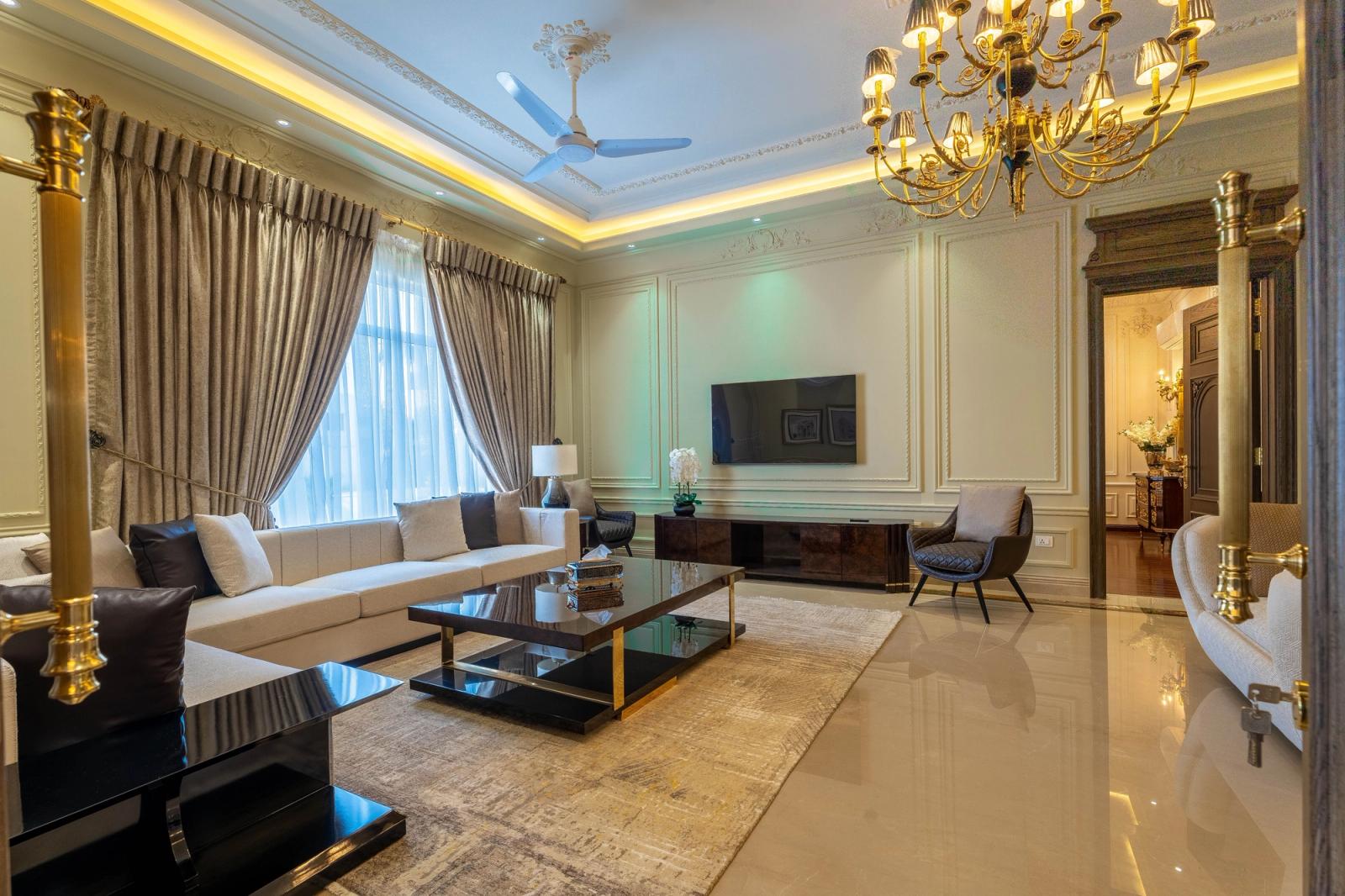 A palatial classical estate with grand, ornate interiors.