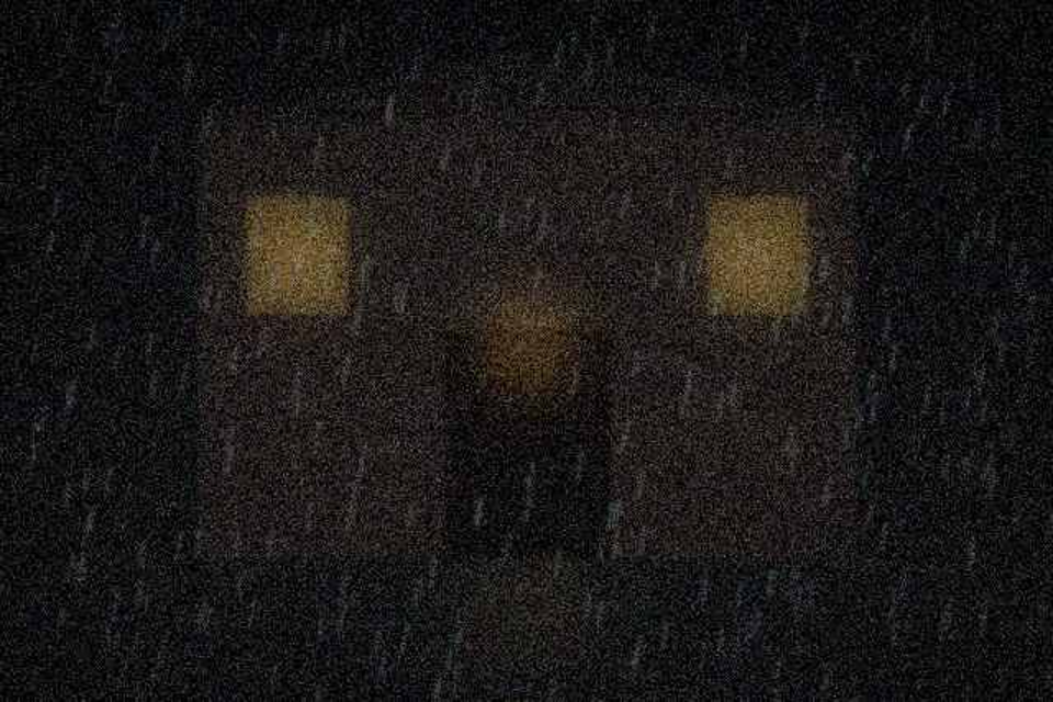 The hall entrance, side street, in the rain