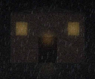 The hall entrance, side street, in the rain