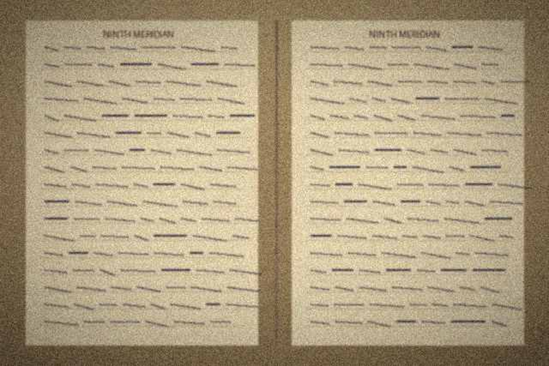Three pages of the ledger, photographed at the shelf