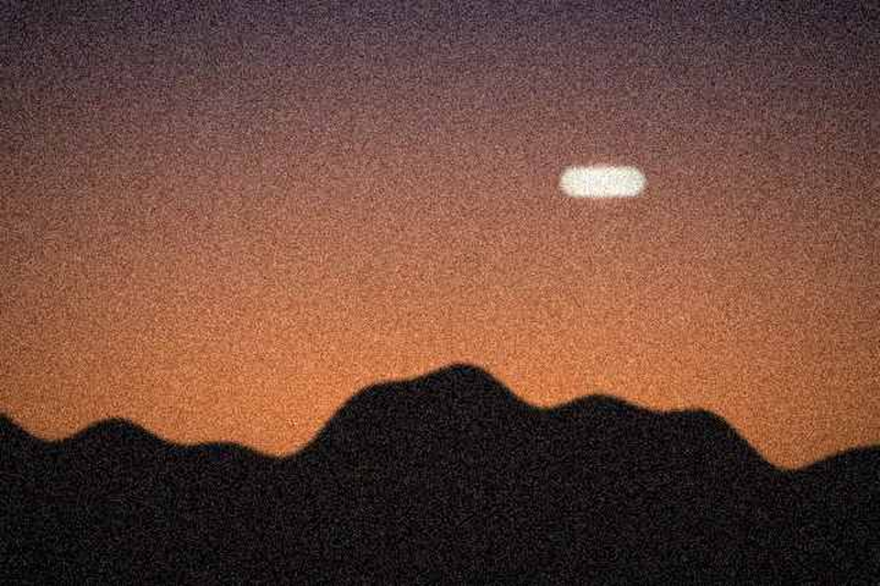 White object over the ridge line