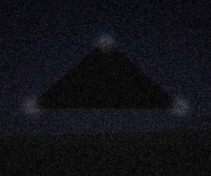 Three lights at the corners, taken through the windscreen
