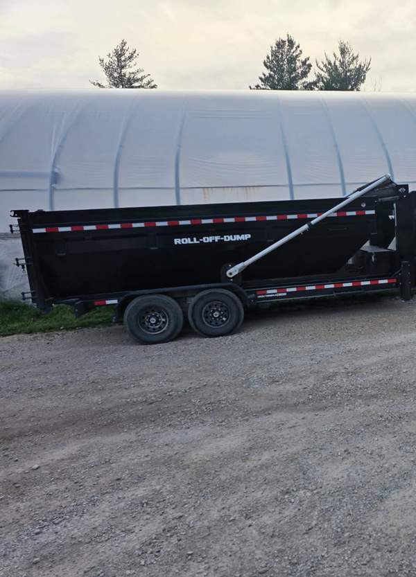 14,000 lb dump trailer with side-loading door