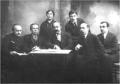 Group portrait of lecturers of the Faculty of Physics at Tbilisi University, with Aleksandre Didebulidze seated in the center.