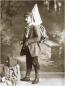Full-length portrait of Aleksandre Didebulidze standing with travel gear and backpack.