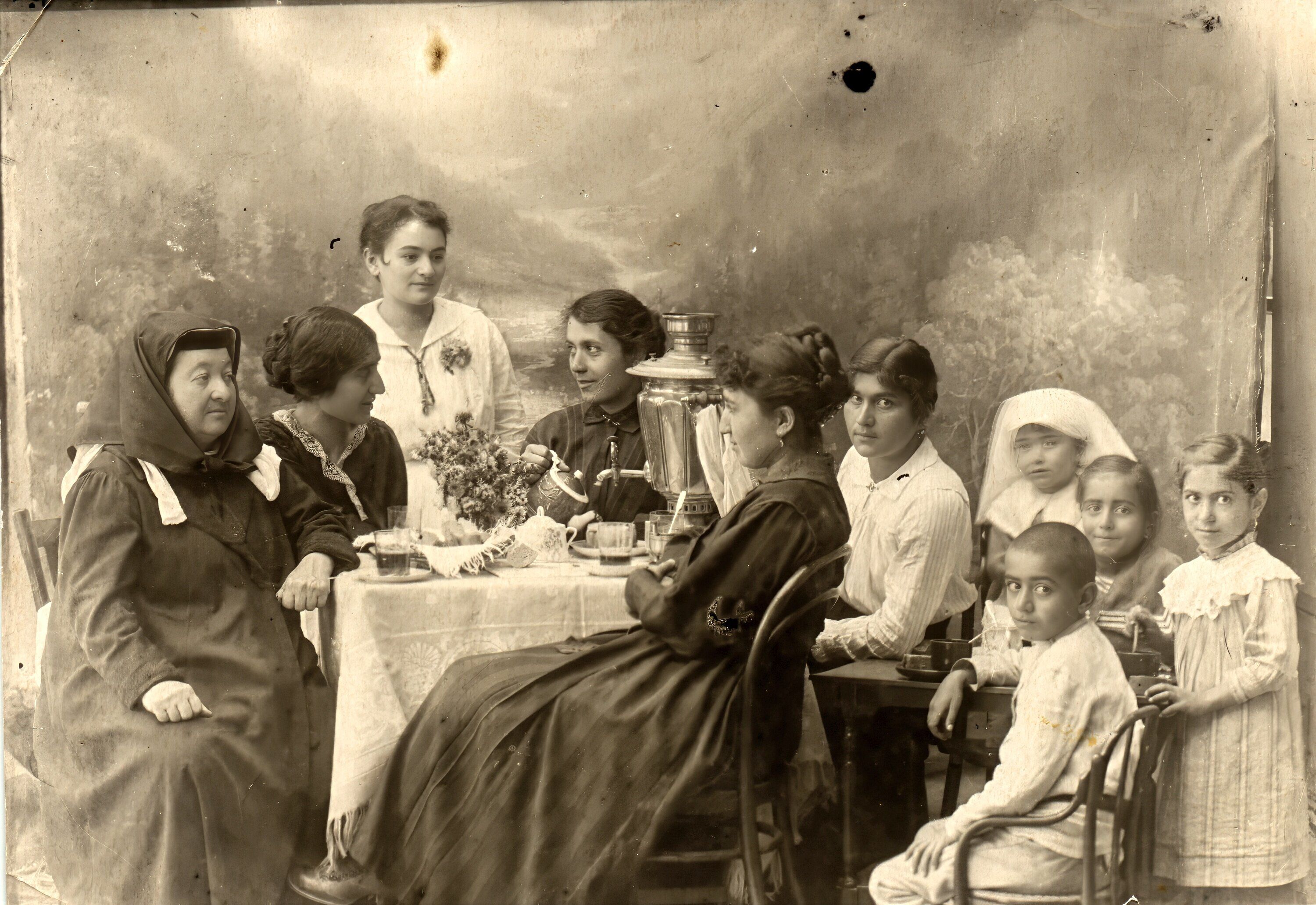 Group portrait of armed men outdoors, titled “The Forest Brotherhood,” photographed by Vasil Roinashvili.