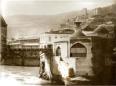 Historic view of the Meidan Mosque and surrounding riverside buildings along the Mtkvari River in Old Tbilisi.