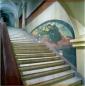 Interior staircase with arched ceiling and mural decoration inside the Theatre of the Artists Society in Tbilisi.