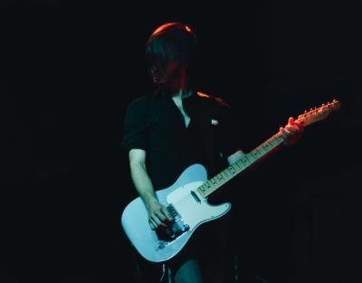 Guitarist in shadow
