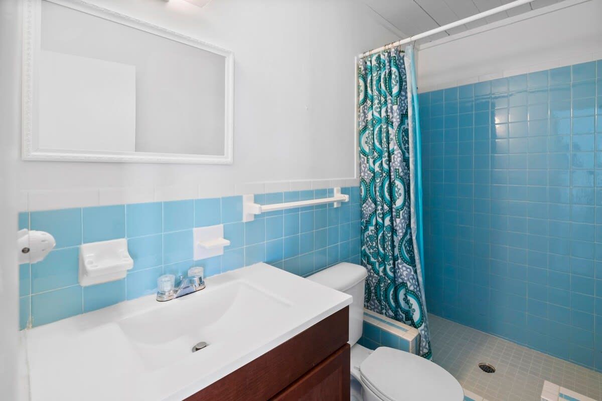 Beachfront white palm villa