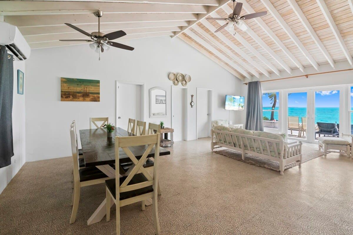 Beachfront white palm villa