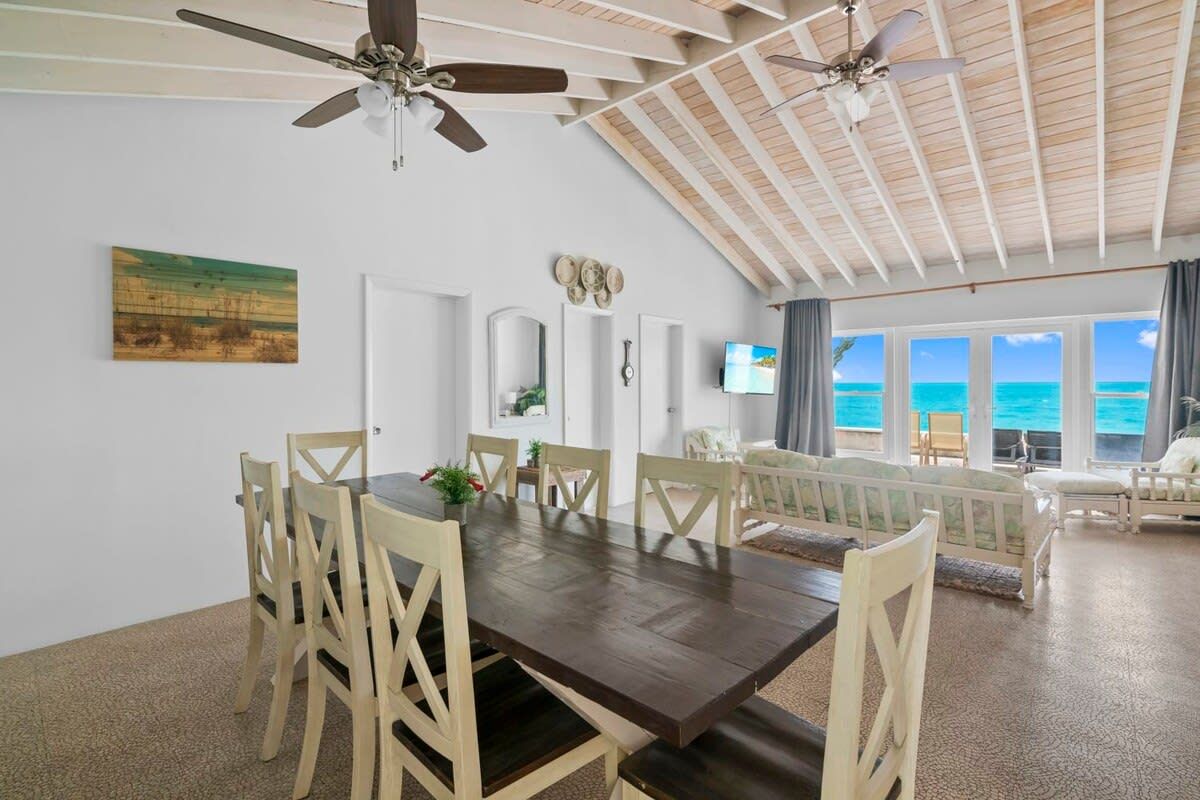 Beachfront white palm villa