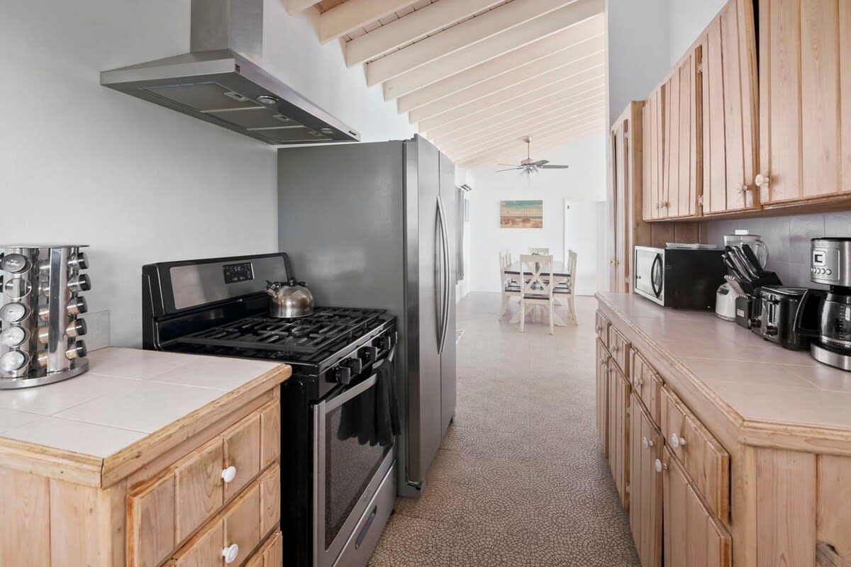 Beachfront white palm villa