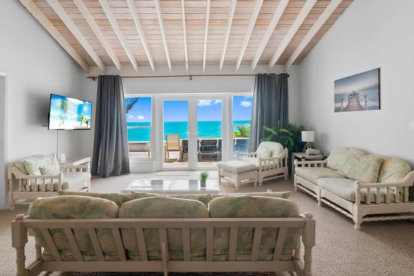 Beachfront white palm villa