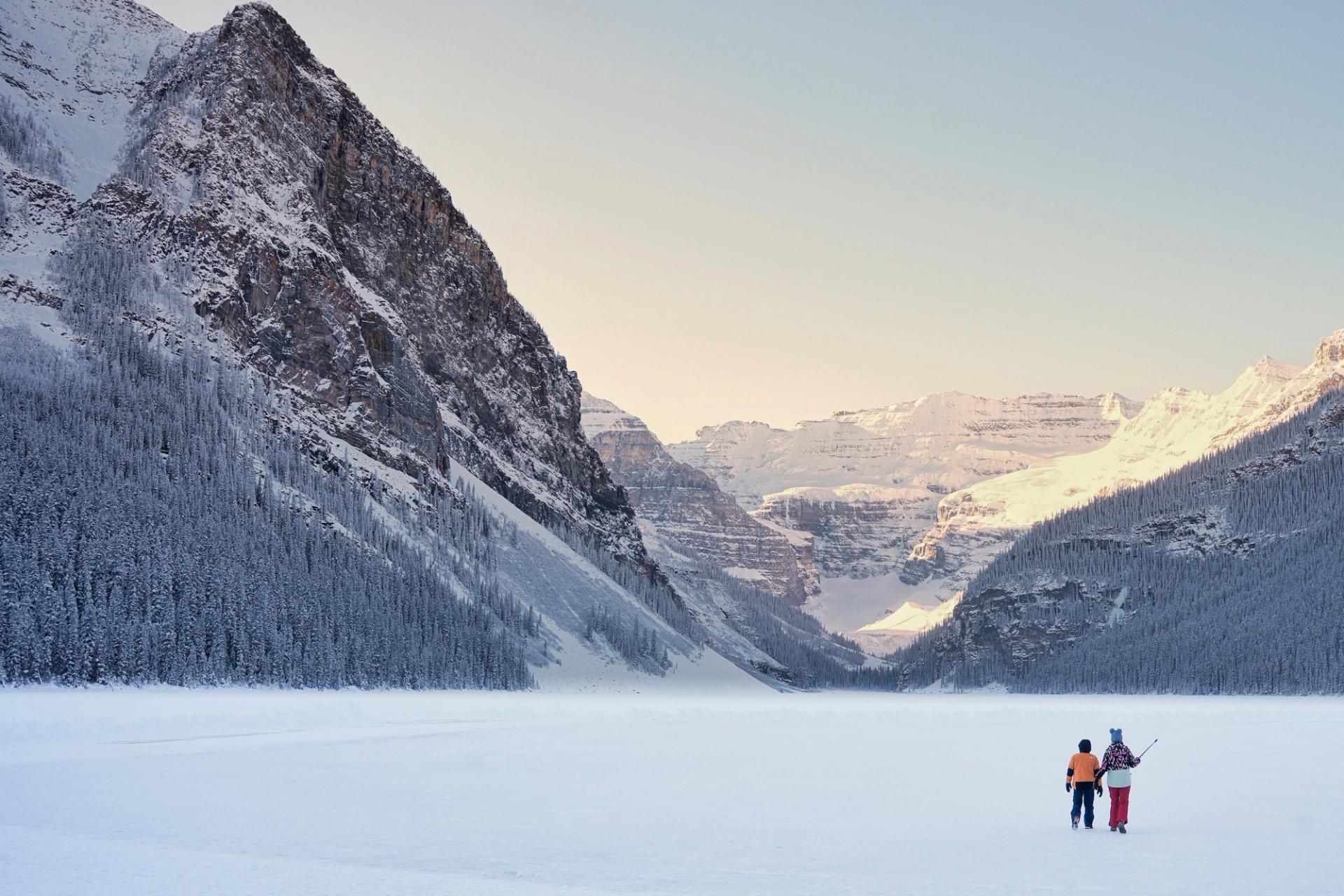 Kids walking on a frozen lake