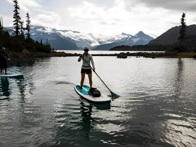 Woman SUPing on a lake