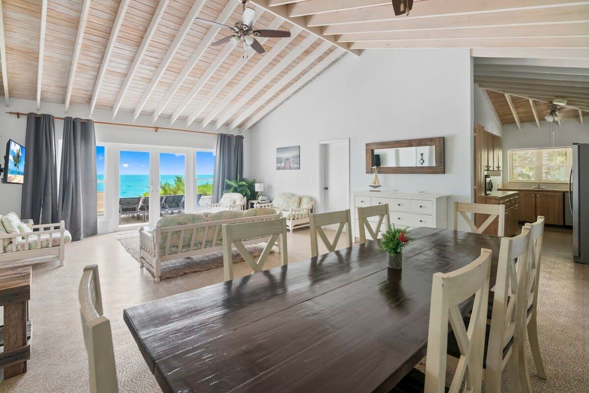 Beachfront white palm villa